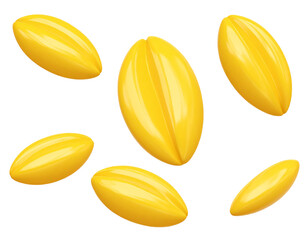 Golden, oblong seeds scattered on black background
