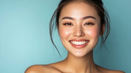Radiant woman's joyful expression against a soft backdrop.