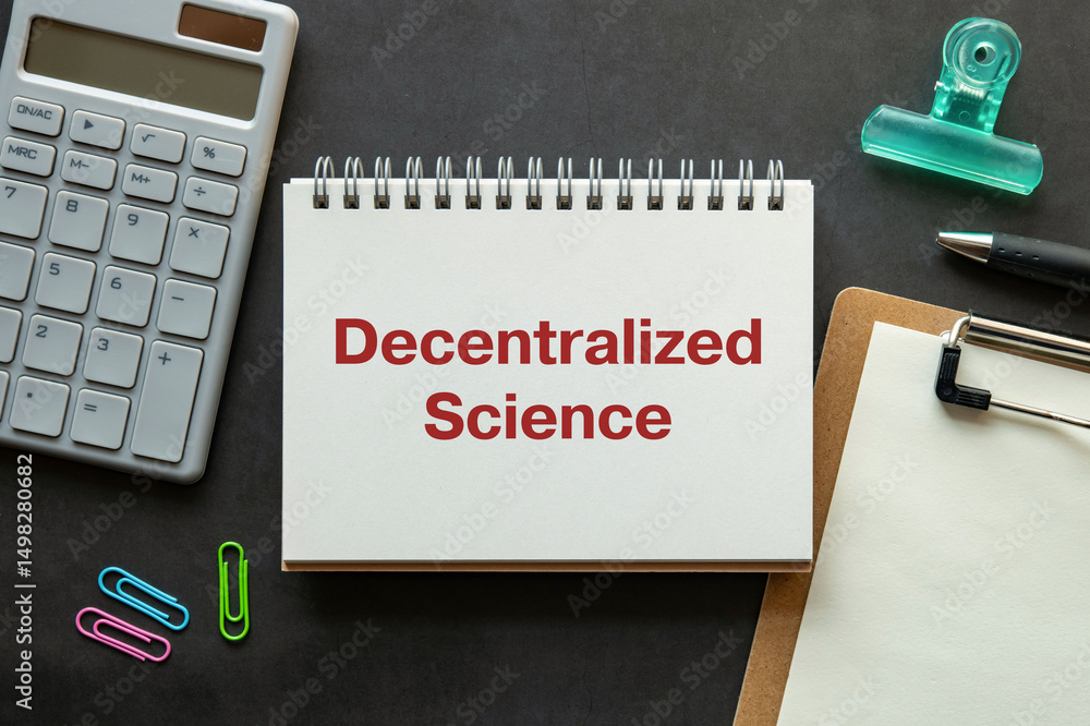 Poster there is notebook with the word decentralized science. it is as an eye-catching image.