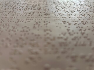 paper background with braille dots