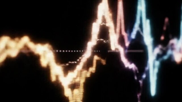 Abstract waveform display with blue and orange lines against blackground