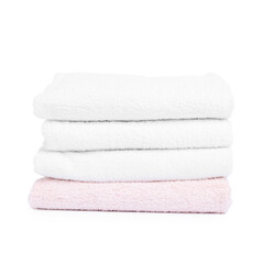 Stack of clean towels isolated on white