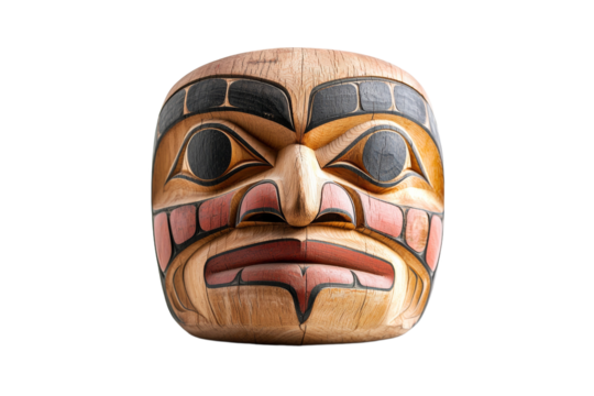 Wooden carving of a face with a frowning expression