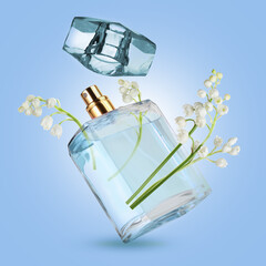 Lilies of the valley and bottle of perfume in air on light blue background