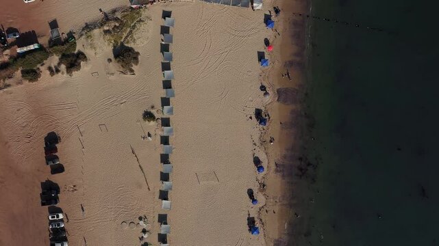 Aerial view of los algodones beach showing umbrellas and calm sea