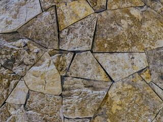 Natural stone wall textured background.
