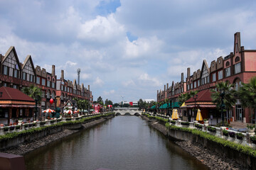 Row Of Outdoor Restaurants Or Cafe Overlooking Canalcity