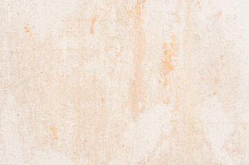 Textura de pared desgastada con manchas de óxido y tonos cálidos