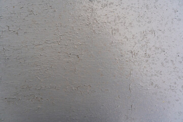 Textura de pared con pintura agrietada y desgaste natural - Fondo vintage de superficie envejecida