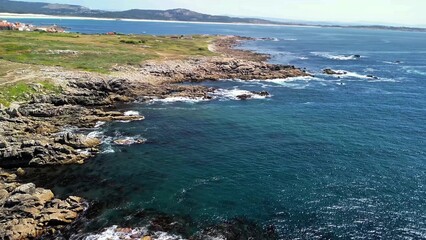 Captivating Coastal Landscapes Featuring Turquoise Waters and Dramatic Rocky Shores