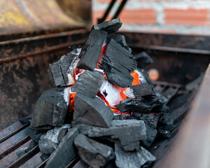 Hot Charcoal on Rustic Grill