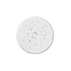 Close-up of a Porous White Disc, Possibly a Bath Bomb or Similar Product