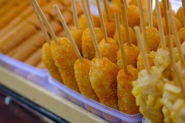 A corn dog is a hot dog on a stick that has been coated in a thick layer of cornmeal batter and...