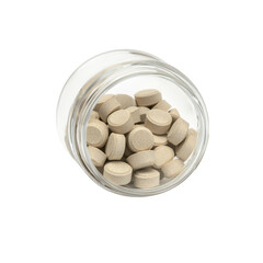 Beige Tablets in a Glass Jar on White Background