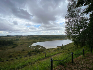Experience the serene lake surrounded by lush greenery that inspires awe and wonder
