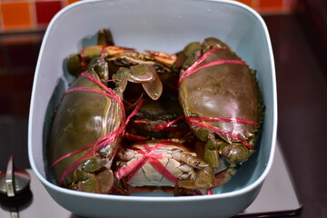 yellow curry with serrated mud crab, Fresh serrated mud crabs prepare to sell on street food market, Giant Mud Crabs, Serrated mud crab, Mangrove crab, Black crab,nighttime