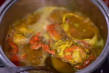yellow curry with serrated mud crab, Fresh serrated mud crabs prepare to sell on street food market, Giant Mud Crabs, Serrated mud crab, Mangrove crab, Black crab,nighttime