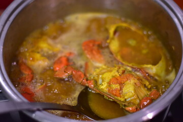 yellow curry with serrated mud crab, Fresh serrated mud crabs prepare to sell on street food market, Giant Mud Crabs, Serrated mud crab, Mangrove crab, Black crab,nighttime