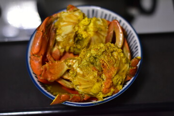 yellow curry with serrated mud crab, Fresh serrated mud crabs prepare to sell on street food market, Giant Mud Crabs, Serrated mud crab, Mangrove crab, Black crab,nighttime