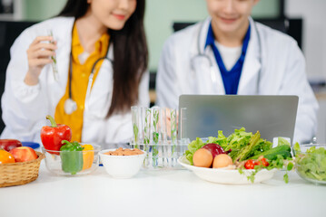Doctors sharing fresh vegetables, promoting health and nutrition. Ideal for wellness, healthcare, and science themes.