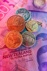 Coins and banknotes are issued by the Reserve Bank of New Zealand, which controls monetary policy affecting the NZ economy by setting the official cash rate. 