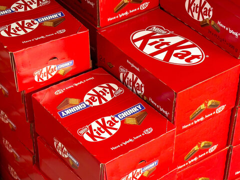 Stack of kit kat chunky red boxes displayed in a retail environment
