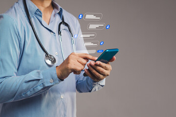 Doctor using smartphone with chat bubbles symbolizing online consultation or medical messaging.