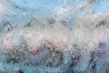 Aqua background. Product space next to clean water streams and water splashes and drops.