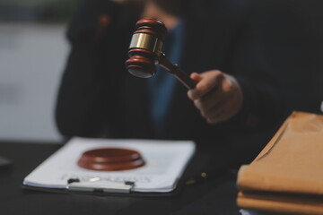 female business woman lawyers working at the law firms. Judge gavel with scales of justice. Legal law, lawyer, documents, advice and justice concept.