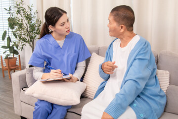 Friendly nurse assisting senior female patient with a blanket, showing warmth, kindness, and daily assistance in a private caregiving setting, healthcare, take care, advice, caregiver, lifestyle.