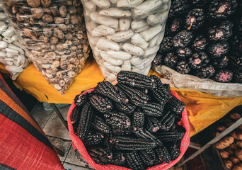 Purple Corn and Potatoes at a Peruvian Traditional Market
