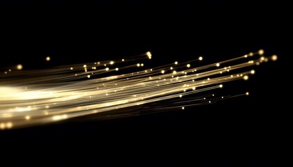 Abstract design of golden light trails on a black background.