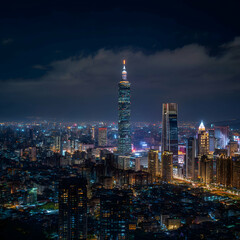 Nighttime Cityscape Of Taipei Taiwan With Illuminated Skyscrapers And Buildings Under Cloudy Sky