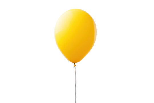 Single yellow balloon floating on black background: minimalist design, cut out
