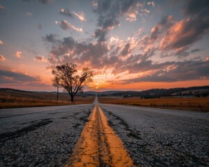 Fototapeta premium Country Road Sunset Landscape with Single Tree