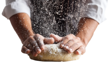 Hands kneading dough with flour dusting against black background, cut out