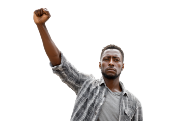 Young african male demonstrating with raised fist in protest against black background, cut out
