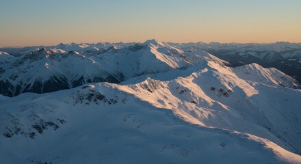 Snowy Mountain Range Against a Clear Sky