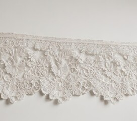 Obraz premium Delicate ivory lace trim on crisp white, intricate detailing , handmade, ornate, vintage