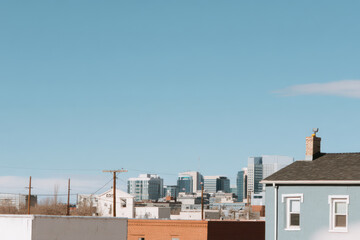 Fototapeta premium aerial view of vibrant city rooftop featuring striking and colorful graffiti art piece