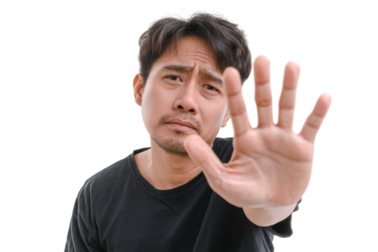 Young asian male gesturing stop with outstretched hand, cut out