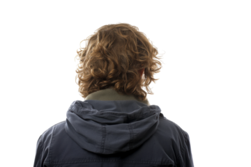 Rear view of male with curly blonde hair and jacket against black background, cut out