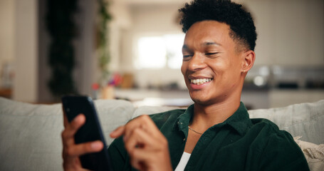 Plakat Relax, smile and phone with man on sofa for social media, movie platform and streaming service. Happiness, entertainment app and subscription with person in living room at home for multimedia search