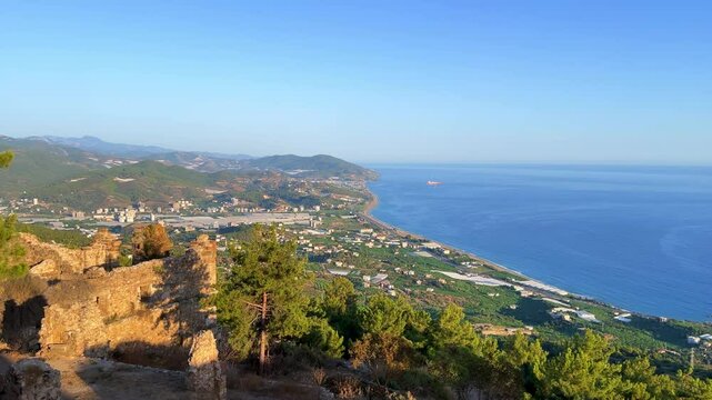Ruins of the ancient Roman port city of Siedra in Alanya, Antalya, Turkey. The street and ruins of the ancient abandoned ancient city of Siedra on the Mediterranean coast. 4К