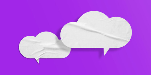 White speech bubble crumpled paper isolated on purple background