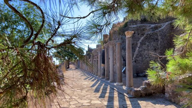 Ruins of the ancient Roman port city of Siedra in Alanya, Antalya, Turkey. The street and ruins of the ancient abandoned ancient city of Siedra on the Mediterranean coast. 4К