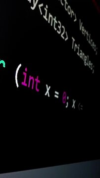 Closeup macro shot movement of coding script moving across LED screen with real-time AI-generated typing, showcasing advanced AI learning in optimization, debug and coding for software development.