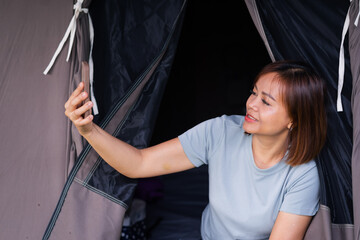 Close up of young woman using smartphone