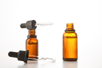 Aromatherapy brown open dropper bottles mockups.