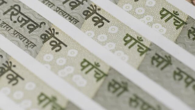 five hundred rupees notes close up shot, Reserve bank of india print in english and hindi with Security Thread , macro, push in shot, 4k.